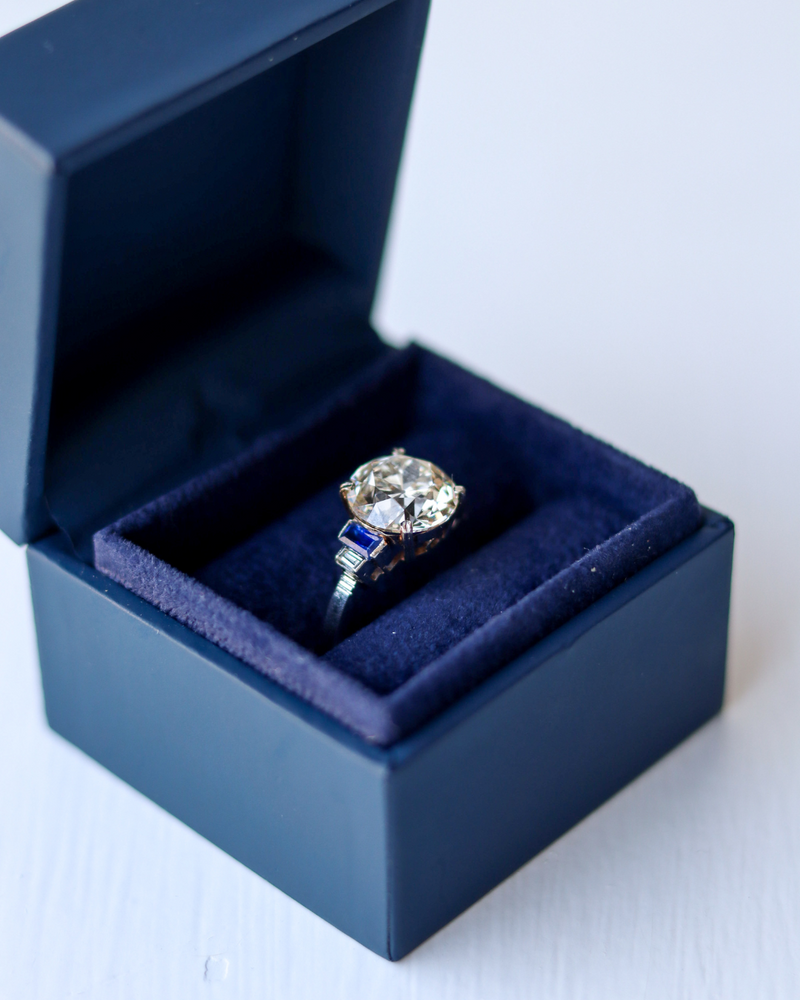 Art Deco Diamond Solitaire with Sapphire Set in Platinum