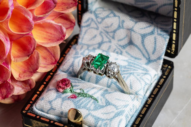 Emerald and Diamond trilogy ring set in white gold