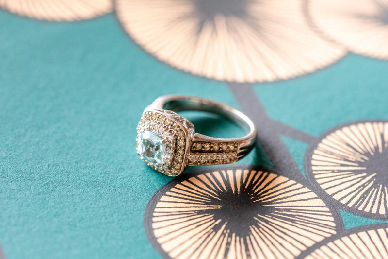Topaz & diamond ring set in 18ct white gold